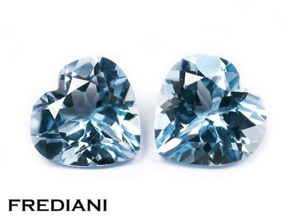 Appairage de topazes bleues traitées coeurs 100x100 de 7.29 carats