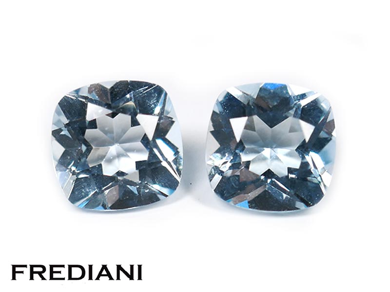 Paire de topazes bleues traitées coussins
